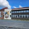 De muurschildering verwijst naar het Pajottenland